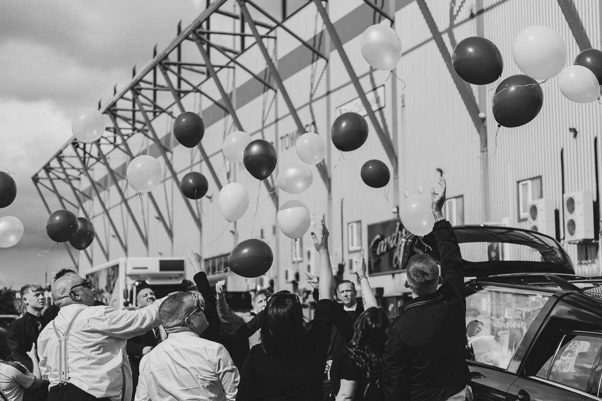 Balloons being released into the sky in remembrance