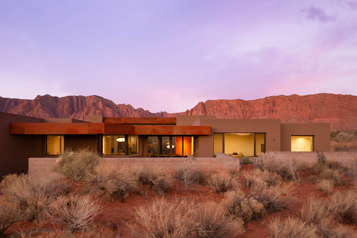 Twilight home exterior in Utah mountains