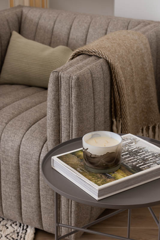 Comfy chair and book on table