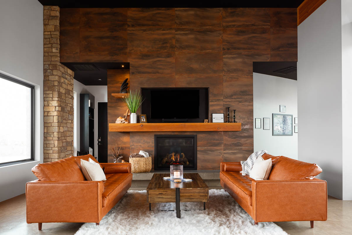 Modern living room with orange couches