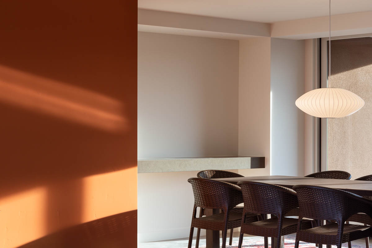 Sunlit dining room table and lampshade 