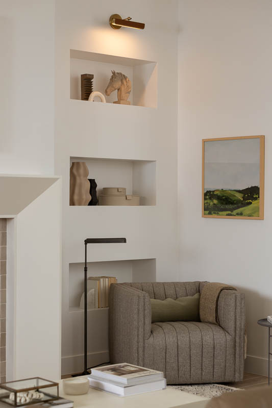 Living room corner with chair and inbuilt shelving