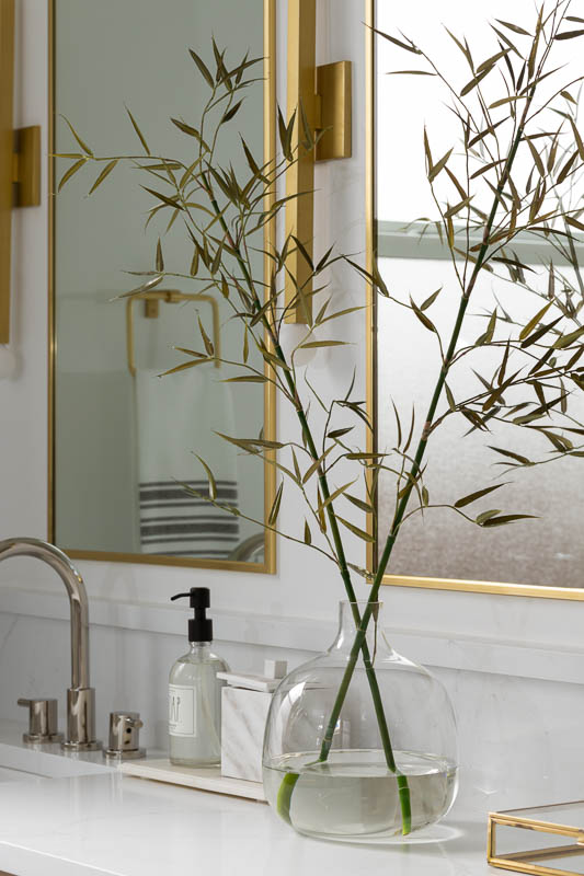 Glass vase on bathroom counter top