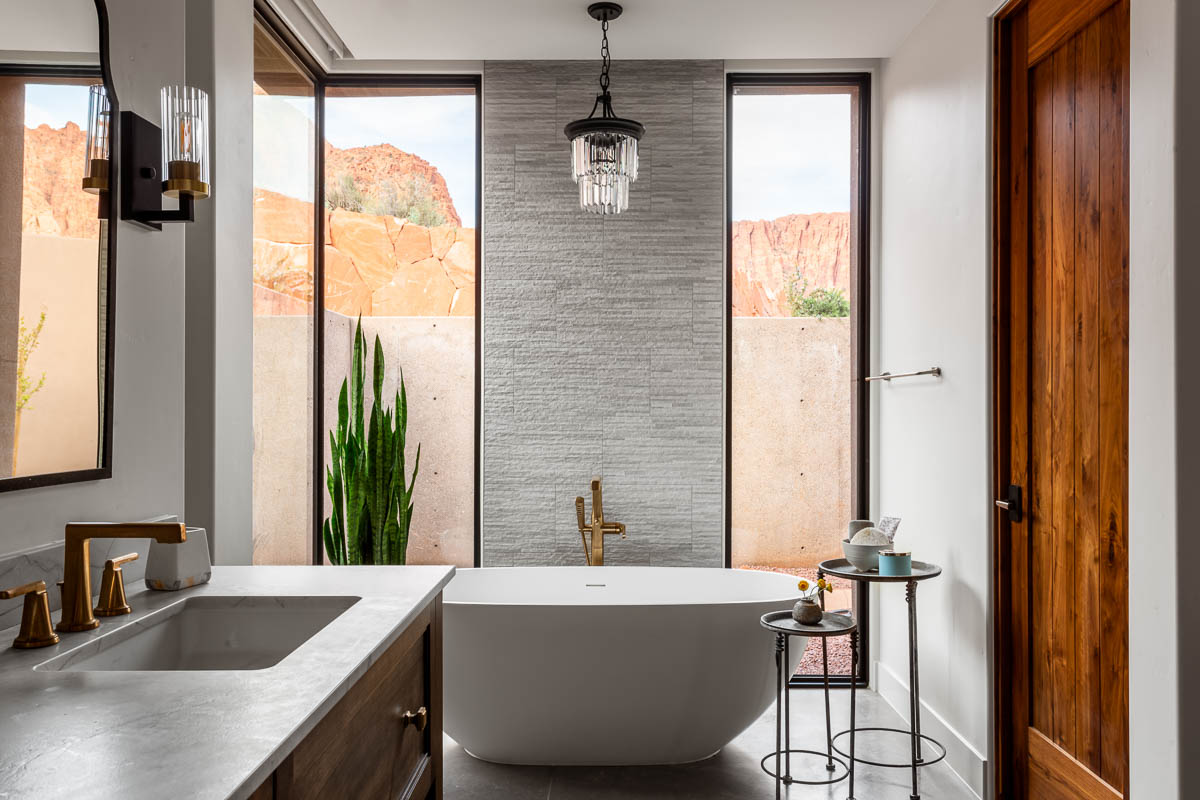 Bathroom with free standing bath and mountain views